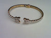 10KT 1.11CT D-BANGLE BAGUETTES "BUTTERFLY