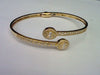 10KT 0.73CT D-BYPASS BANGLE